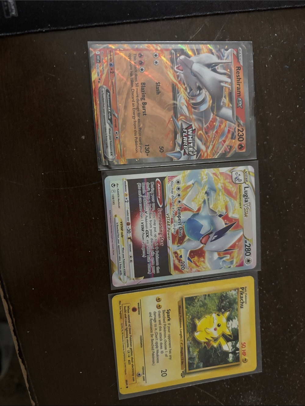 Pokémon Trading Card Lot - Reshiram GX, Lugia VSTAR , pikachu(Assorted color